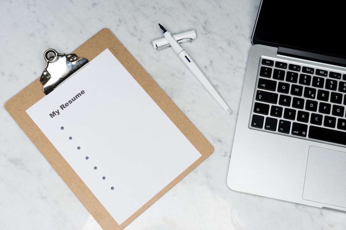 Notebook and recorder on the bench with Make Good slips attached to corrected proofs